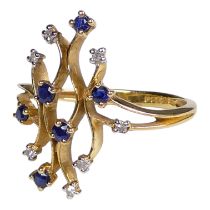 A diamond and sapphire dress ring - with an unusual setting, size N, weight 2.3g.