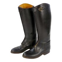 A pair of brown leather riding boots - size 43.