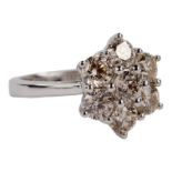 An 18ct white gold seven stone daisy style diamond ring - diamond weight 2.16ct, size O, with