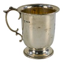 A silver christening mug - London 1929, Charles Boyton & Son Ltd, engraved with initials, raised