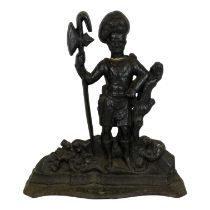 A 19th century cast iron door stop - modelled in the form of a Scottish soldier, height 39cm.