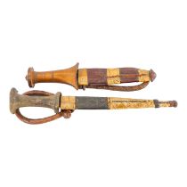 A 19th century middle eastern dagger - with hardwood handle, ridged blade and leather scabbard,