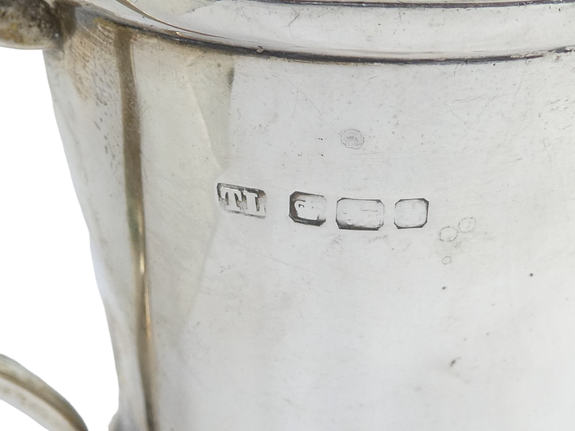 A silver christening mug - Sheffield, marks indistinct, thistle shaped and raised on a circular - Image 3 of 4