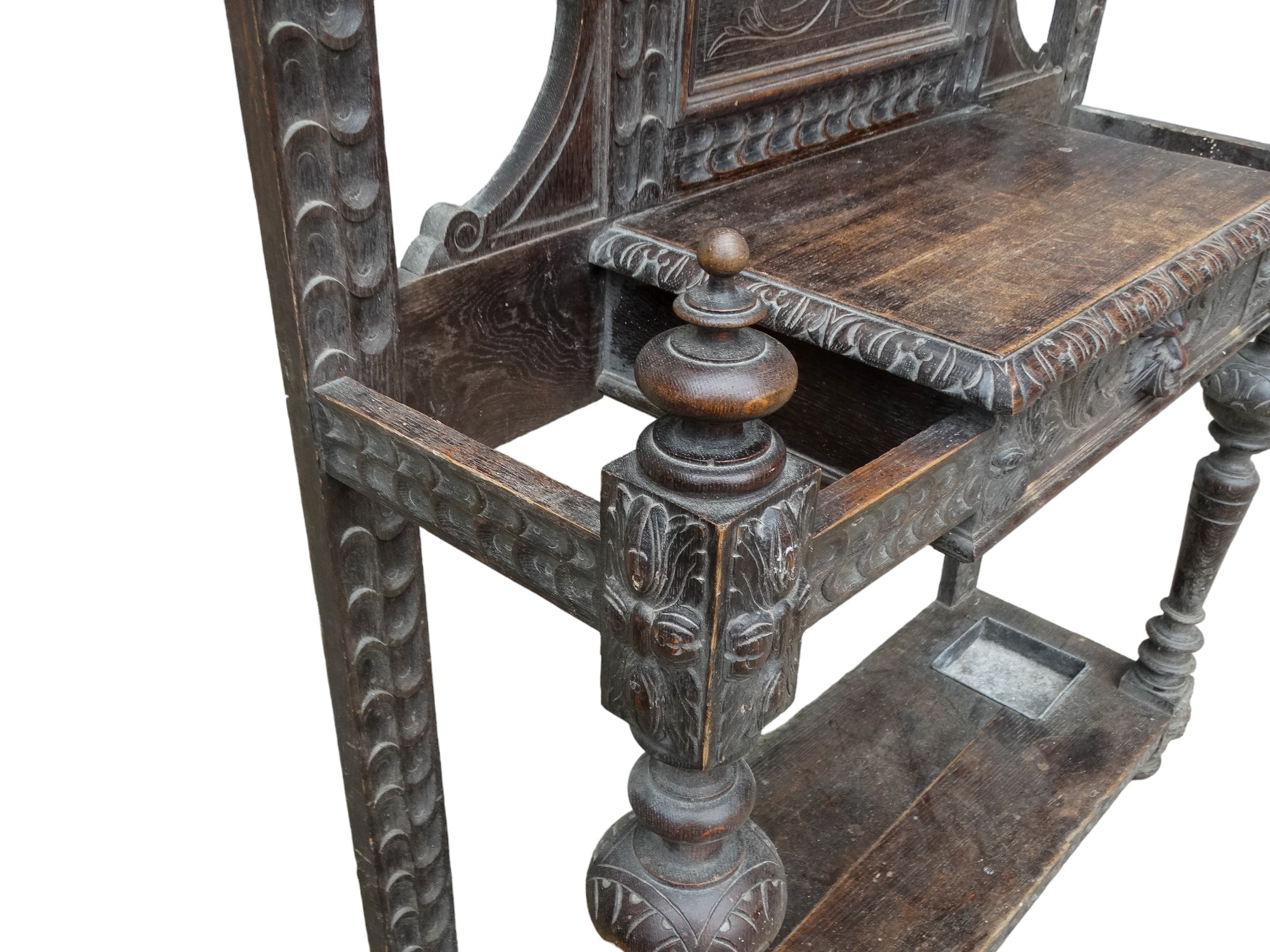 An Edwardian oak hall stand - carved with green-man head above a rectangular mirror and - Image 4 of 5