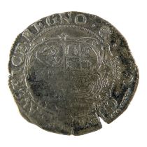 A Charles I 6d coin.