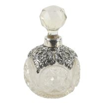 A cut glass and silver mounted scent bottle - Birmingham 1918, Levi & Salaman, the pierced collar