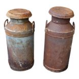 A pair of steel milk churns - lidded with twin handles, branded Unigate Creameries, heights 74cm and