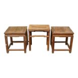 A late 19th century Chinese rectangular oriental hardwood table - the cleated panel top on turned