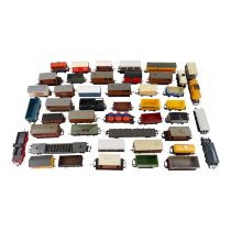 A quantity of Dublo rolling stock - including a variety of closed and open wagons, some with
