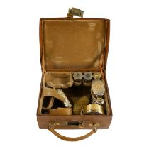 A silver and glass eight piece travelling vanity set - London 1910, to include bottles, a box and