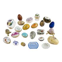 A collection of ceramics eggs - various makers including Limoges and Royal Doulton, together with