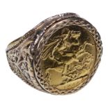 A sovereign ring - dated 1904, in a pierced 9ct gold setting, size Y, weight 17g.