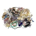 A quantity of costume jewellery - mostly necklaces and beads.