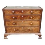 A George III mahogany chest of drawers - with stop-fluted canted corners and an arrangement of