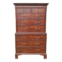 A George III mahogany chest on chest - the upper section with dentil cornice above an arrangement of