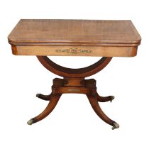 A George IV style mahogany card table - the rectangular fold over top on a U-shaped support with