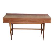 A teak sideboard by Robert Heritage for Archie Shine - with a low raised back and arrangement of