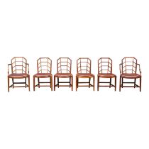 A set of early 20th century oak dining chairs - in the Arts & Crafts manner, after Heals, two with