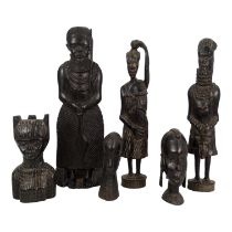 An African carved hardwood figure - in the form of a warrior, 50cm high, together with two further