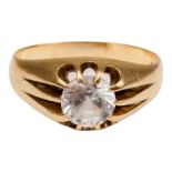 A 9ct yellow gold ring - set a clear stone, size Q, weight 4g.