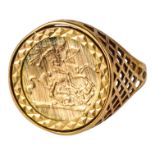 A 9ct gold St George and The Dragon ring - weight 4.3g.