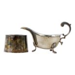 A silver sauce boat - Birmingham 1933, with ogee edge and raised on pad feet, 79g, together with a