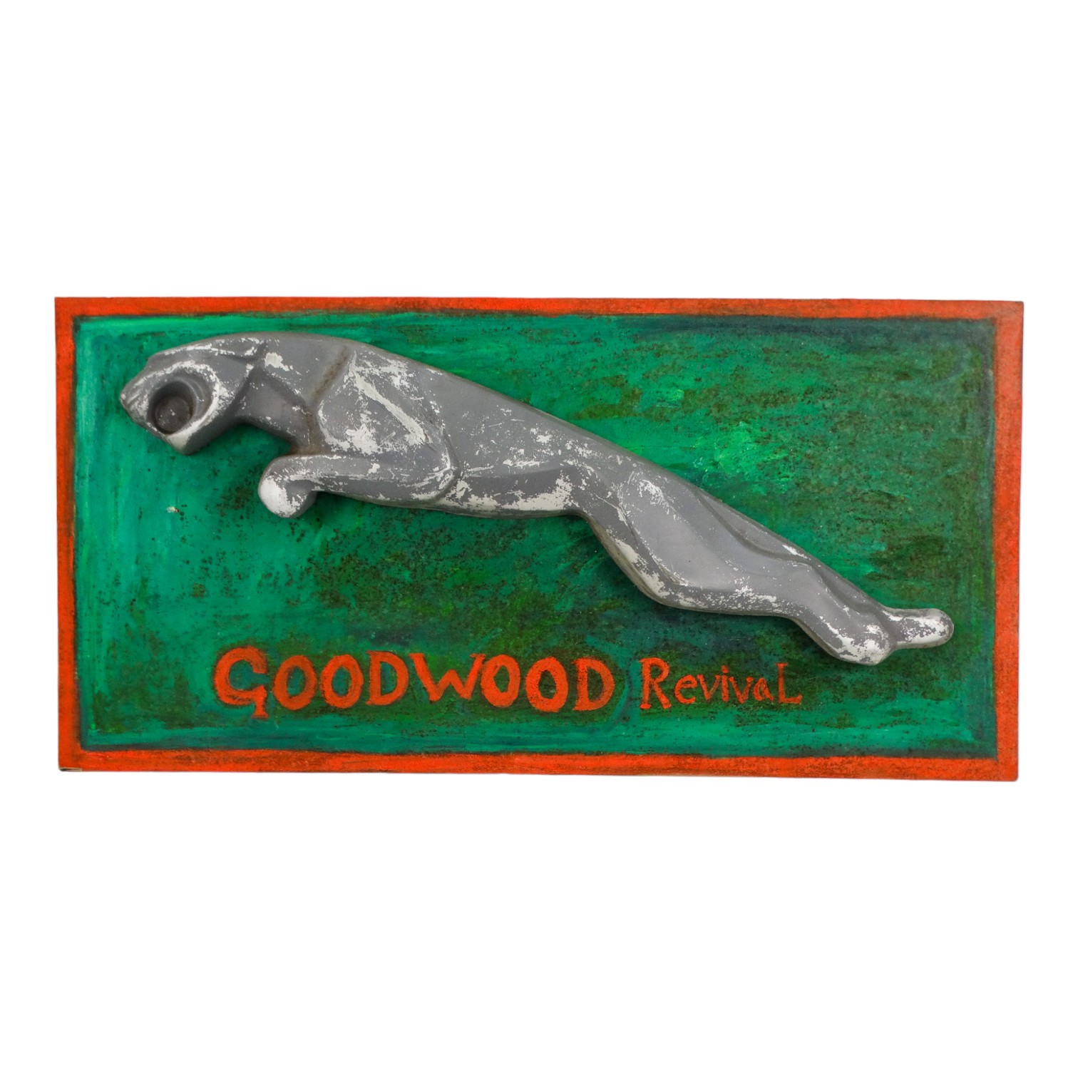 A 20th century Jaguar cars logo - the glass fibre leaping cat mounted on a later board inscribed