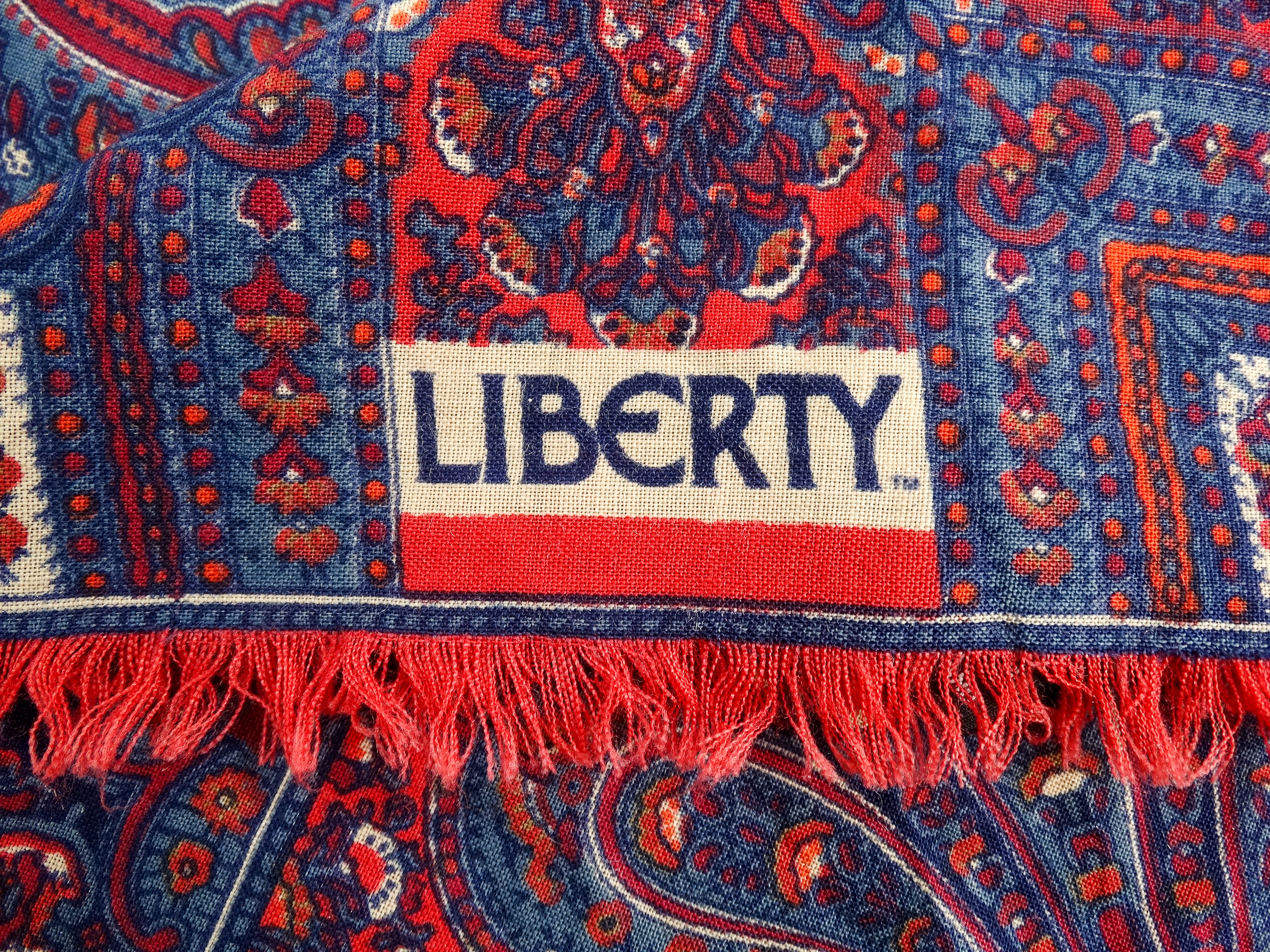 A wool shawl by Liberty - with a red and blue paisley pattern, 130 x 130cm. - Image 3 of 4