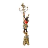 A polychrome painted and parcel gilt composite Blackamoor torchiere - late 20th century, on a gilt