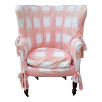 A Victorian mahogany and upholstered tub chair - with a broad pink check fabric loose cover,