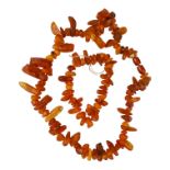 An amber necklace and bracelet - weight 65.4g.
