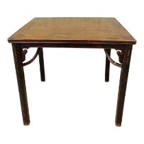 A Chinese oriental hardwood square table - the cleated panel top above a shaped corner bracket, on