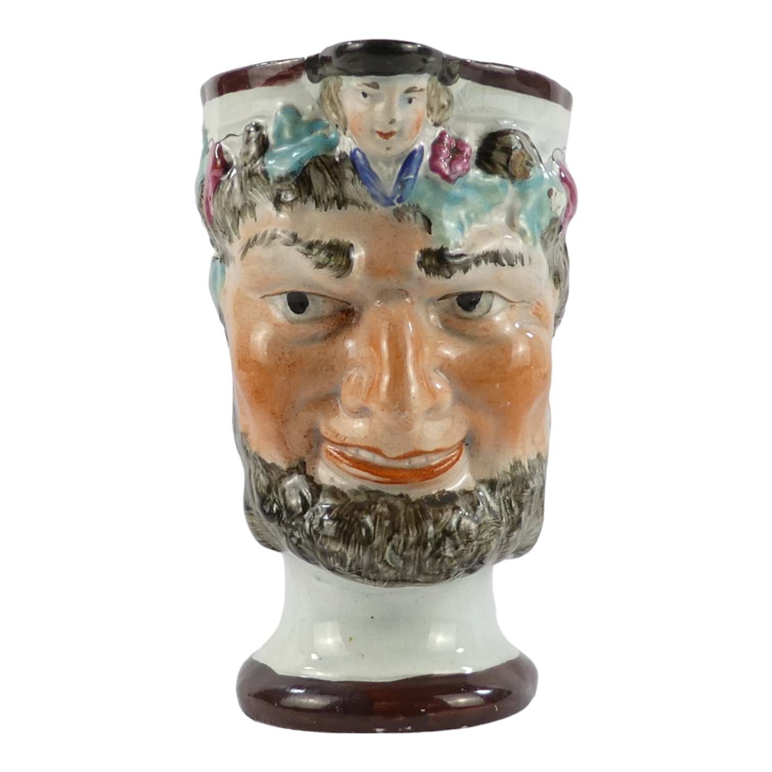 An early 19th century pearlware jug - modelled in the form of Bacchus, height 11cm. - Image 3 of 6