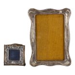 A silver photograph frame - Birmingham 1918, W J Myatt & Co, 16.5 x 11.5cm, together with another