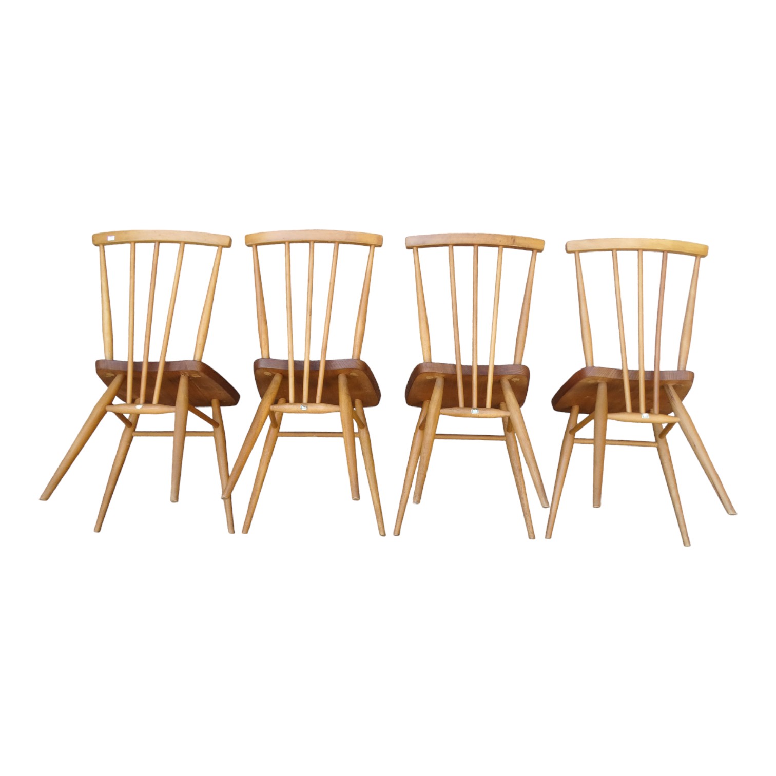 A set of four Ercol elm and beech chairs - with stick backs and contoured seats, on turned - Image 2 of 3