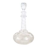 A late 19th century clear glass decanter - mallet form and etched with vine leaves, 24cm high