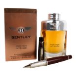A Bretling pen - two tone dark ochre, with a branded clip and disk to top, together with a
