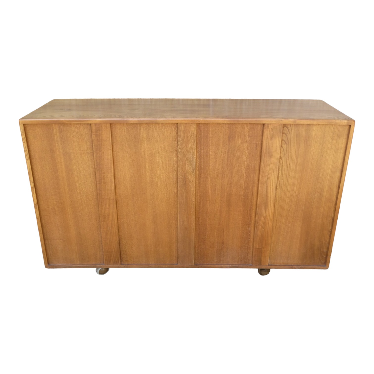 An Ercol elm sideboard - Windsor model 468, with an arrangement of three doors, each enclosing an - Image 5 of 5