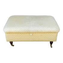 A 20th century upholstered ottoman - of rectangular form and covered in cream foliate fabric, 94 x