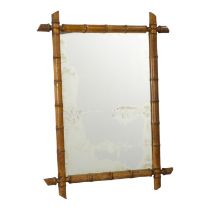 An early 20th century faux bamboo wall mirror - with a rectangular mirror plate, 88 x 62cm.