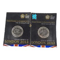 Two Countdown To London 2012 £5 coins - one for 2009 and one for 2010, in original packaging.