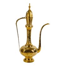 A 20th century Indian brass coffee pot - with incised foliate decoration, 66cm high