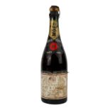 A bottle of Moet and Chandon champagne - 1943 bi-centenary cuvee bottled to commemorate the 200 year