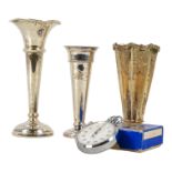 A silver trumpet shaped stem vase - Birmingham 1975, together with two other stem vase and a