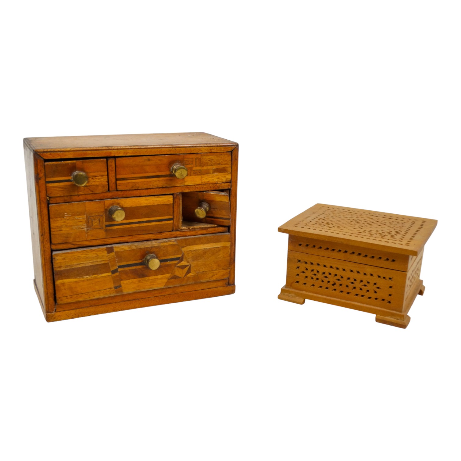 A late 19th century miniature chest - with asymmetrical inlay to drawers, 14cm wide