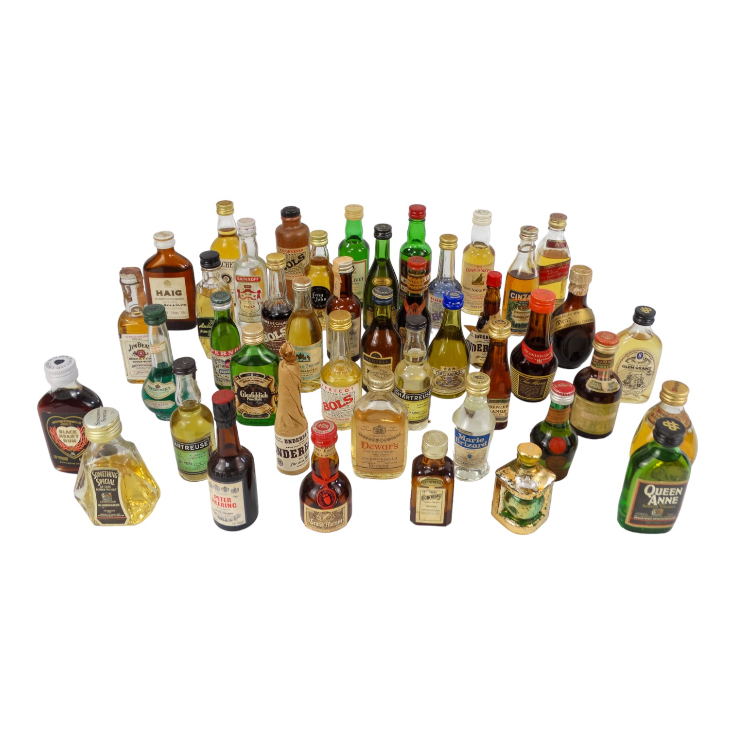 Forty-four miniature bottles of spirits - including some liqueurs.