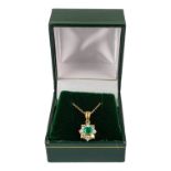 An 18ct yellow gold emerald and diamond pendant - the square step cut emerald surrounded by round
