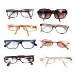 A quantity of fashion prescription glasses and sunglasses - to include Prada, DKNY, Marc Jacobs,