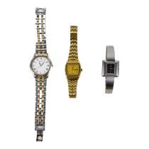 Three Seiko wristwatches.