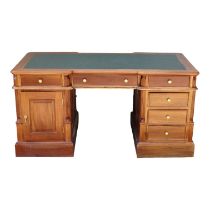 A George III style mahogany pedestal inverted breakfront partners desk - the inset top above an